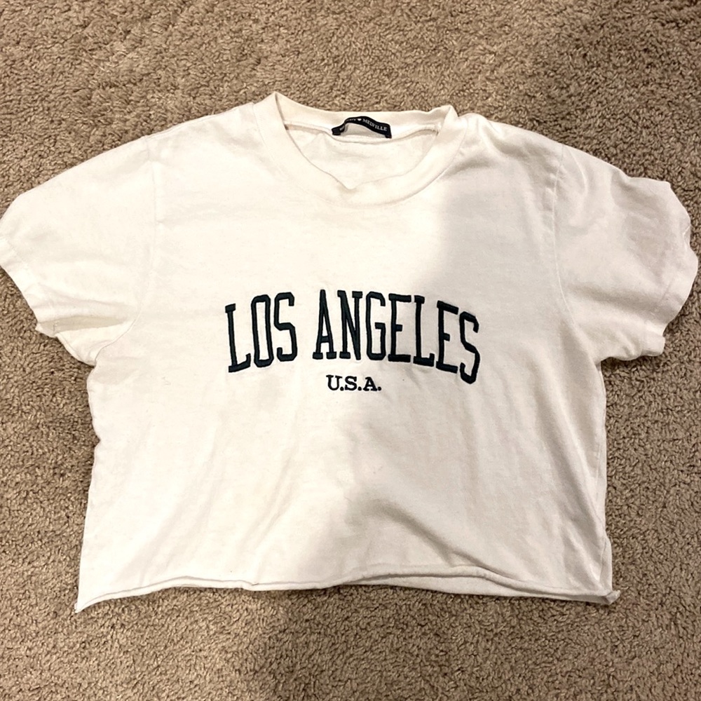 Brandy Melville white crop top with green embroidered Los Angeles text